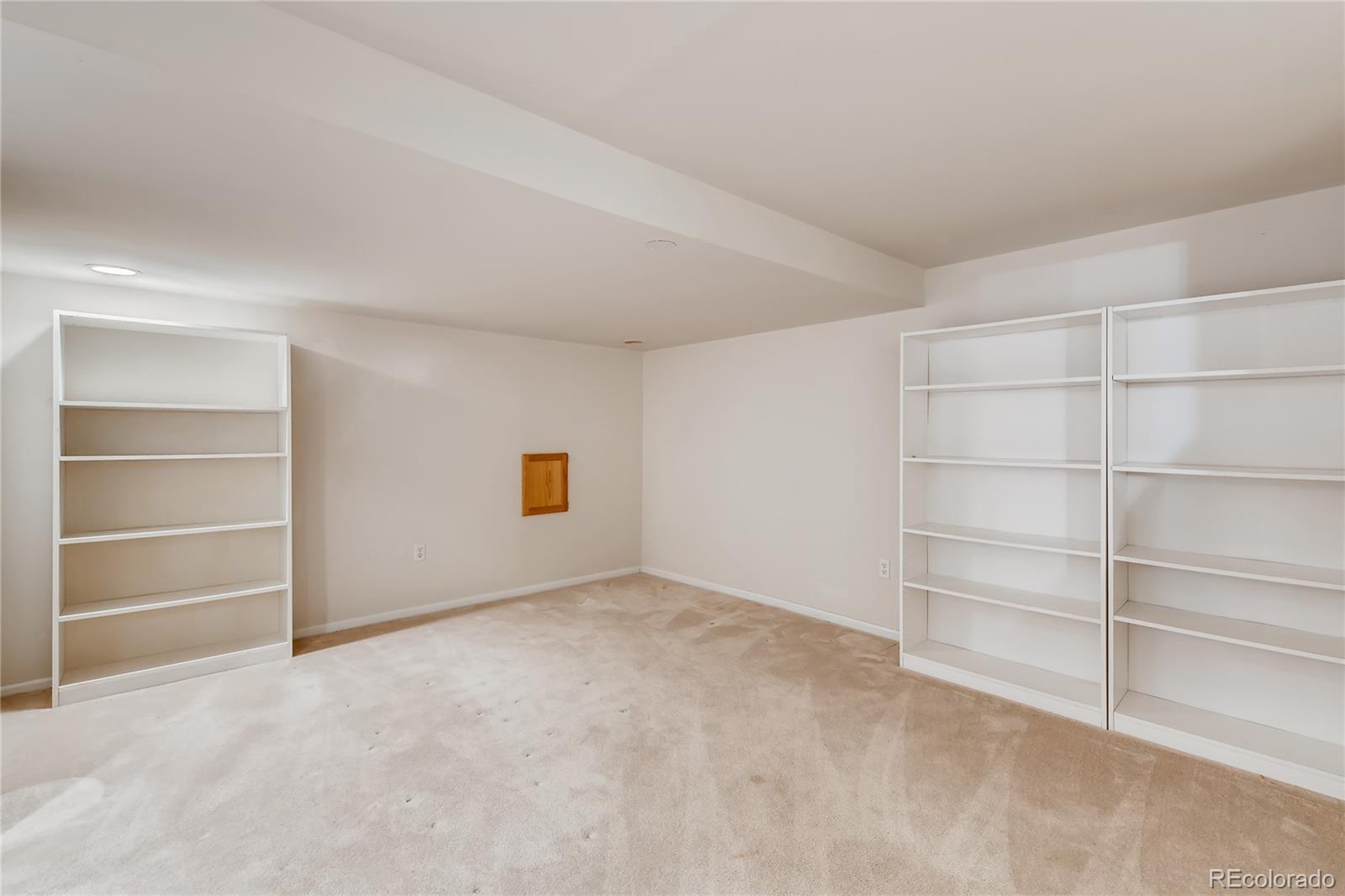 6137 Trailhead Road Highlands Ranch, CO 80130 - Photo 21 of 27 a view of an empty room with a closet
