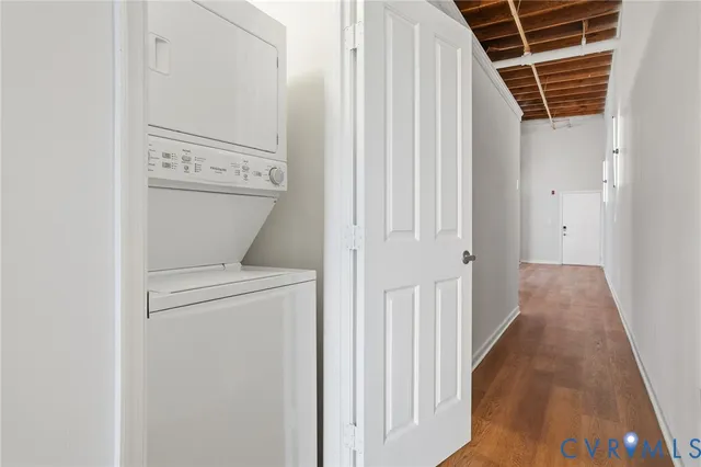 a view of a hallway with washer and dryer