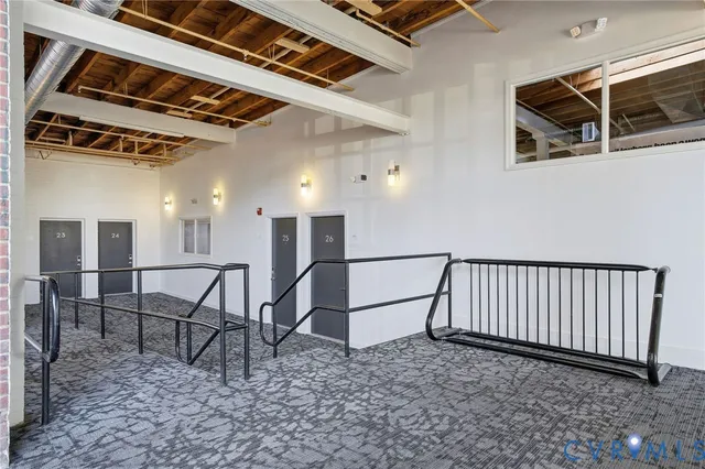 a view of a chairs and table in a room