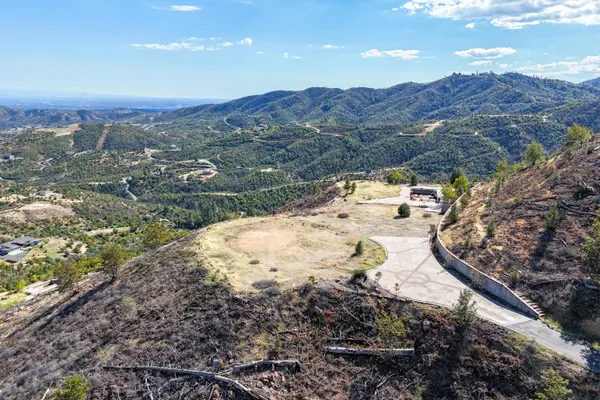 a view of a backyard of a house