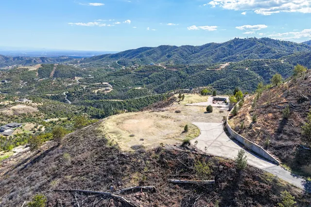 a view of a backyard of a house