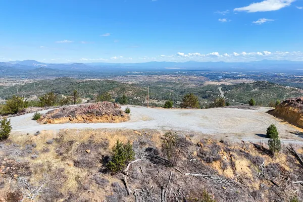 a view of a lake with mountains in the background