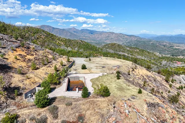 a view of a backyard of a house