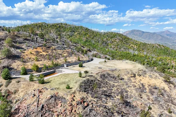 a view of a lake with mountains