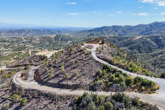 an aerial view of residential house and outdoor space