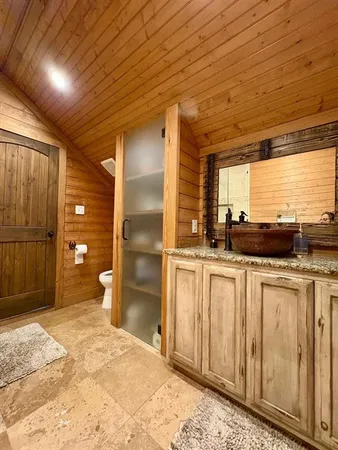 a bathroom with a sink and a shower