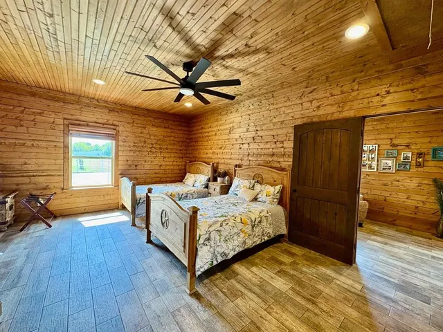 a view of a livingroom with furniture and wooden floor