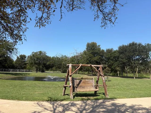 a garden view with a seating space