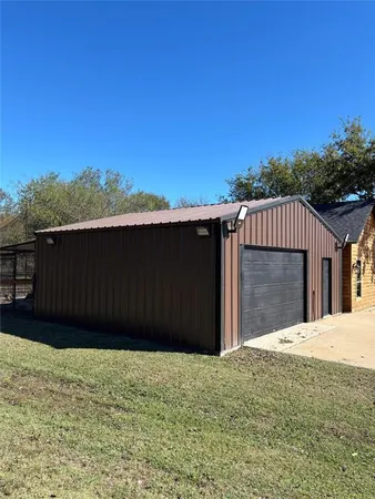 a view of a backyard of the house