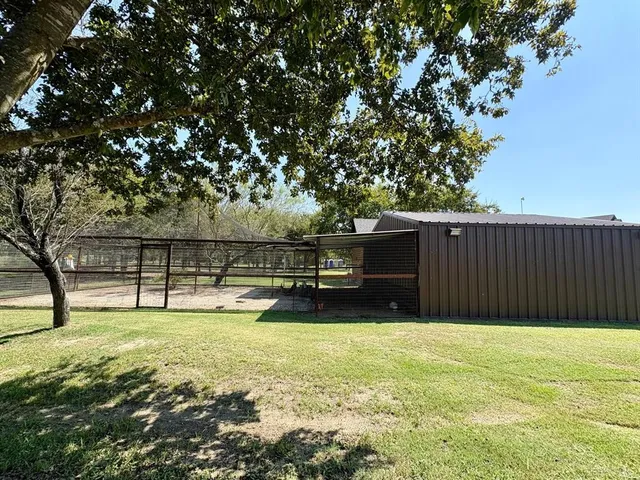 a swimming pool with wooden fence