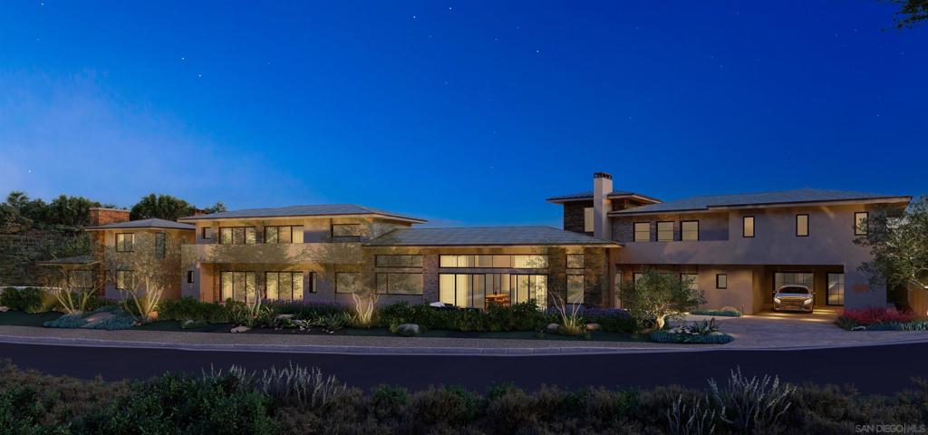 Via Rancho Cielo Rancho Santa Fe, CA 92067 - Photo 11 of 16 a front view of a house with a yard