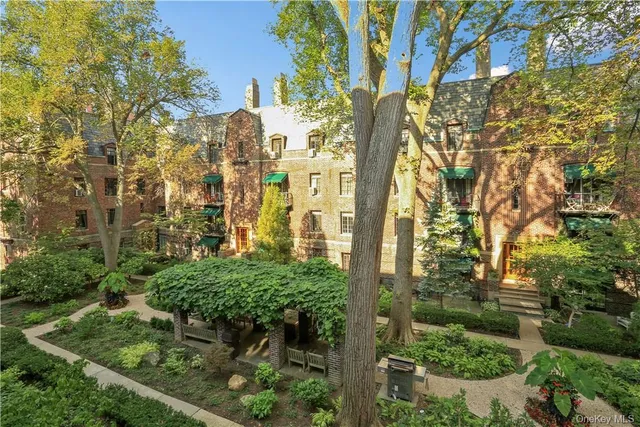 front view of a house with a small yard