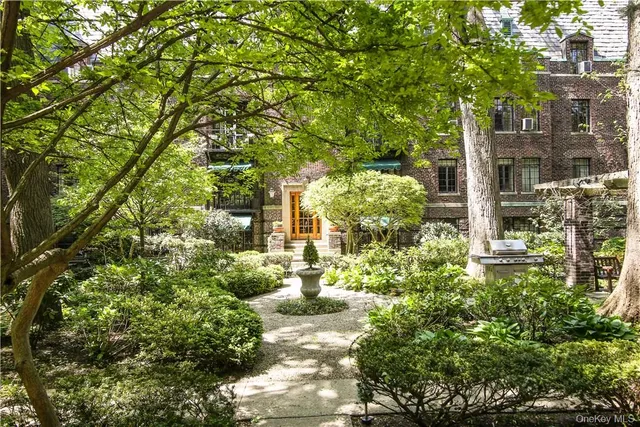 a view of a pathway with a building in the background
