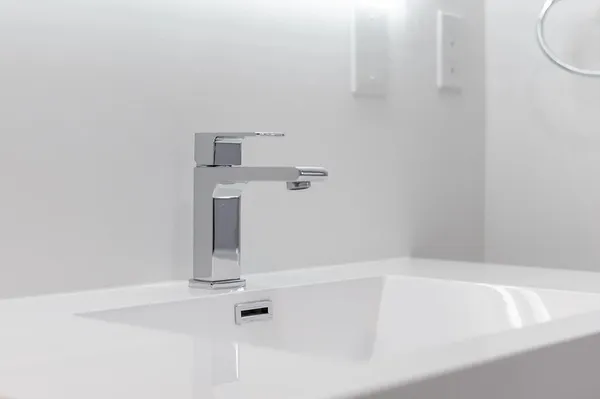 wooden floor with a bathroom