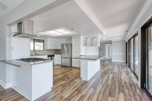 a view of an empty room and closet area