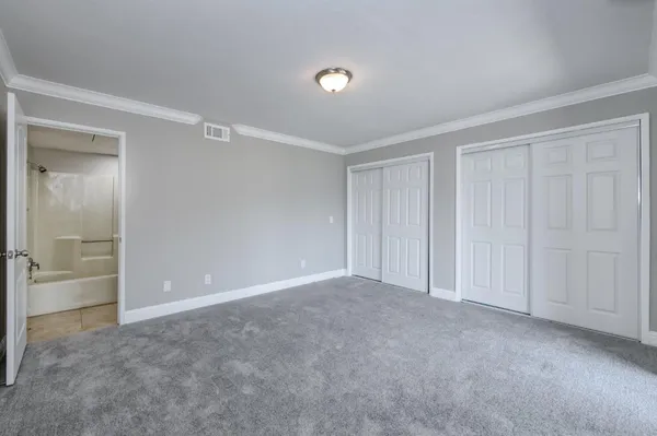 a view of a room with a window