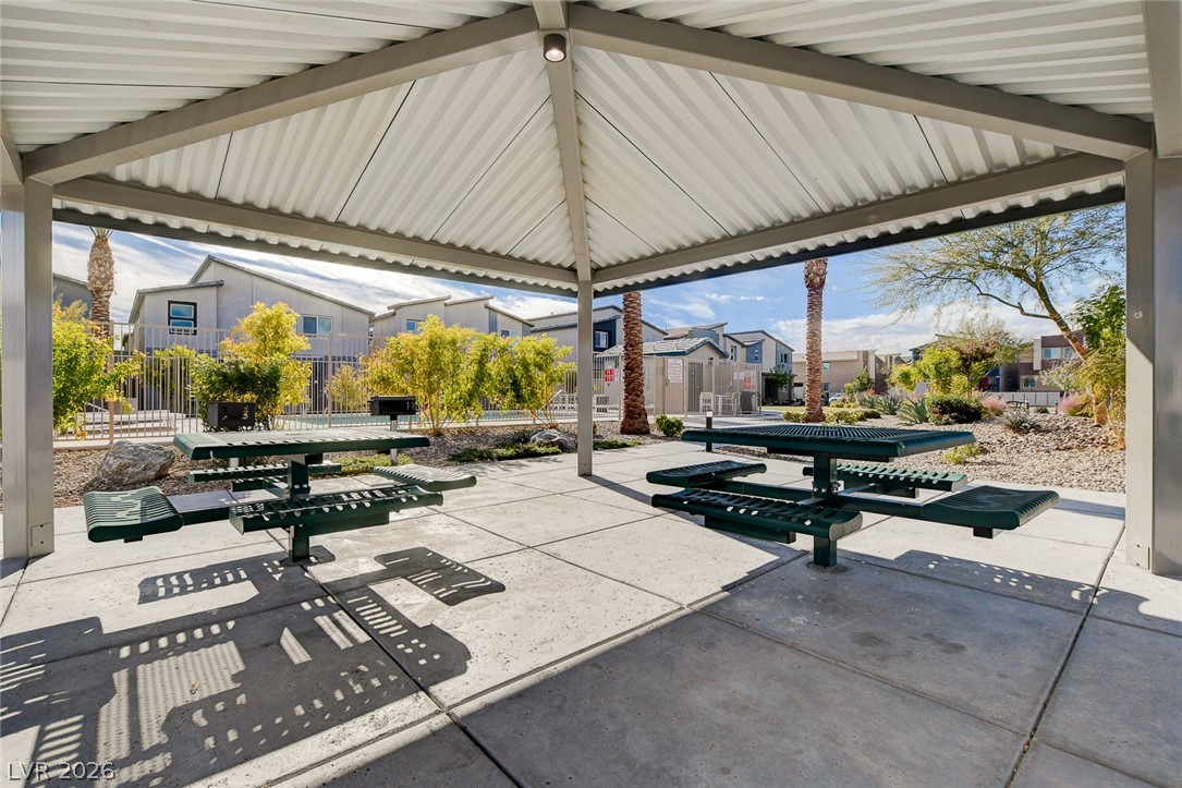 7330 North Decatur Boulevard, Unit 6 North Las Vegas, NV 89084 - Photo 23 of 42 A shaded picnic area provides a comfortable gathering spot amidst desert landscaping.