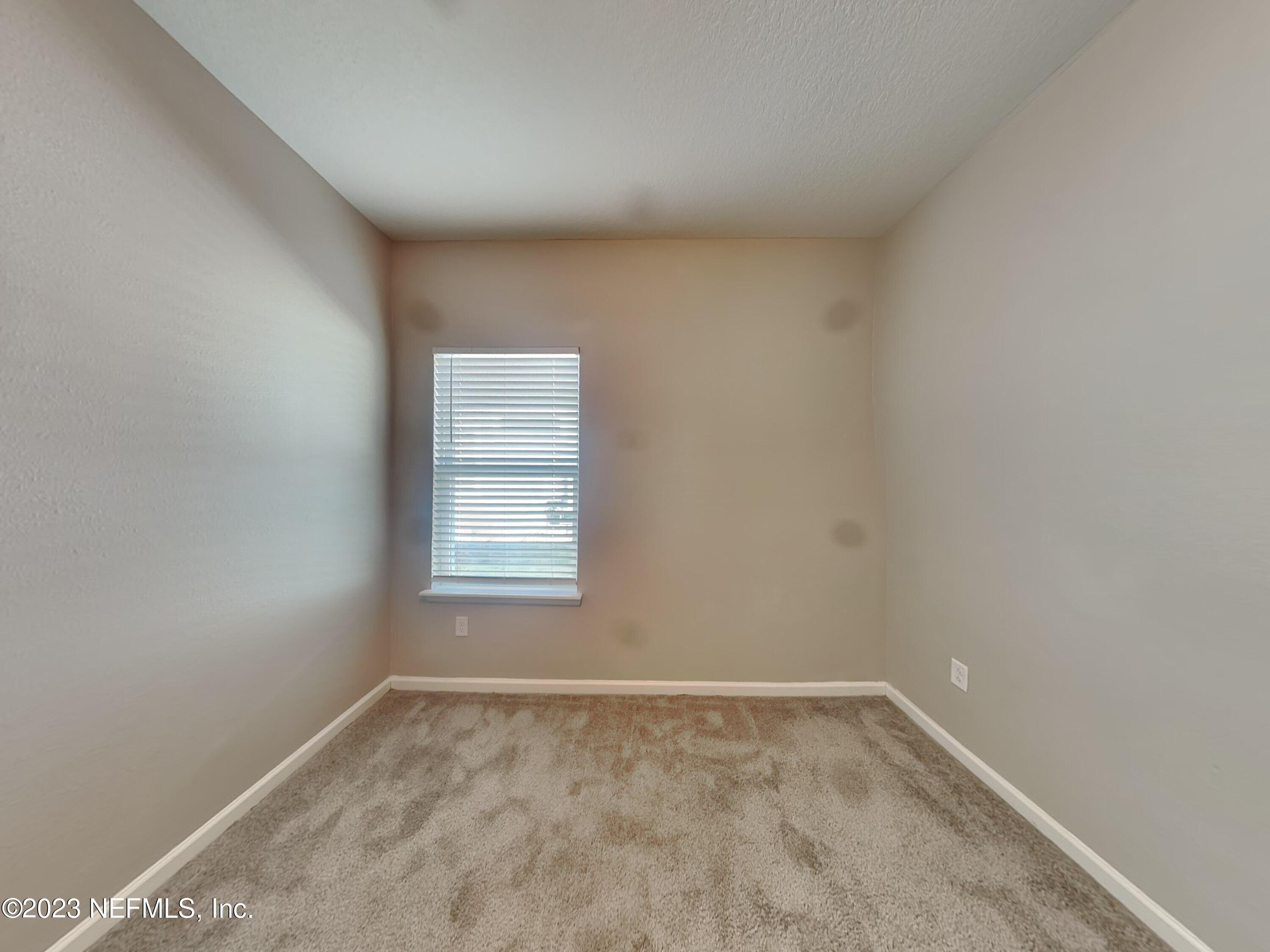 164 Bloomfield Way St. Augustine, FL 32092 - Photo 13 of 21 a view of a room that has a window in it