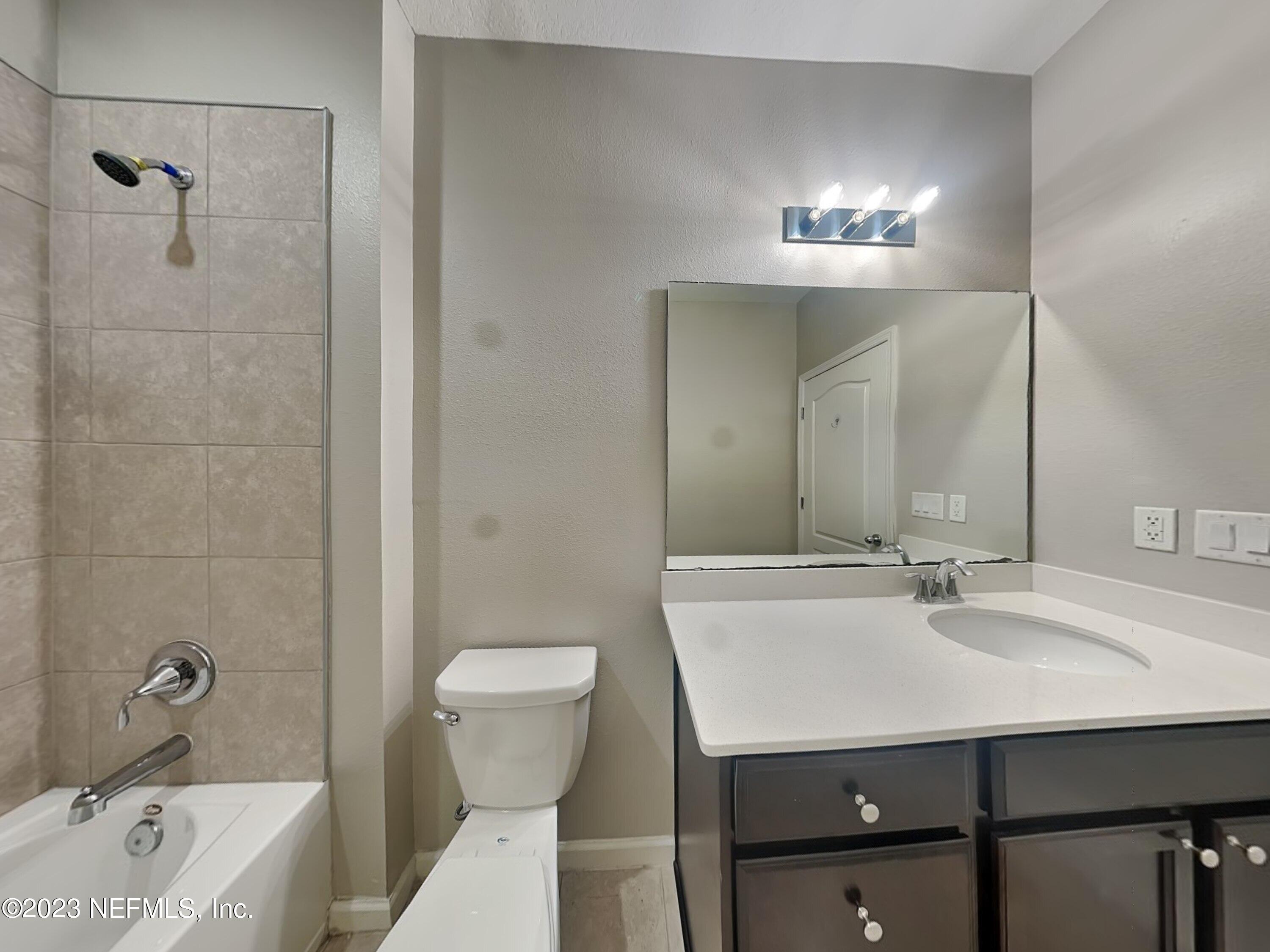 164 Bloomfield Way St. Augustine, FL 32092 - Photo 15 of 21 a bathroom with a sink a toilet and shower