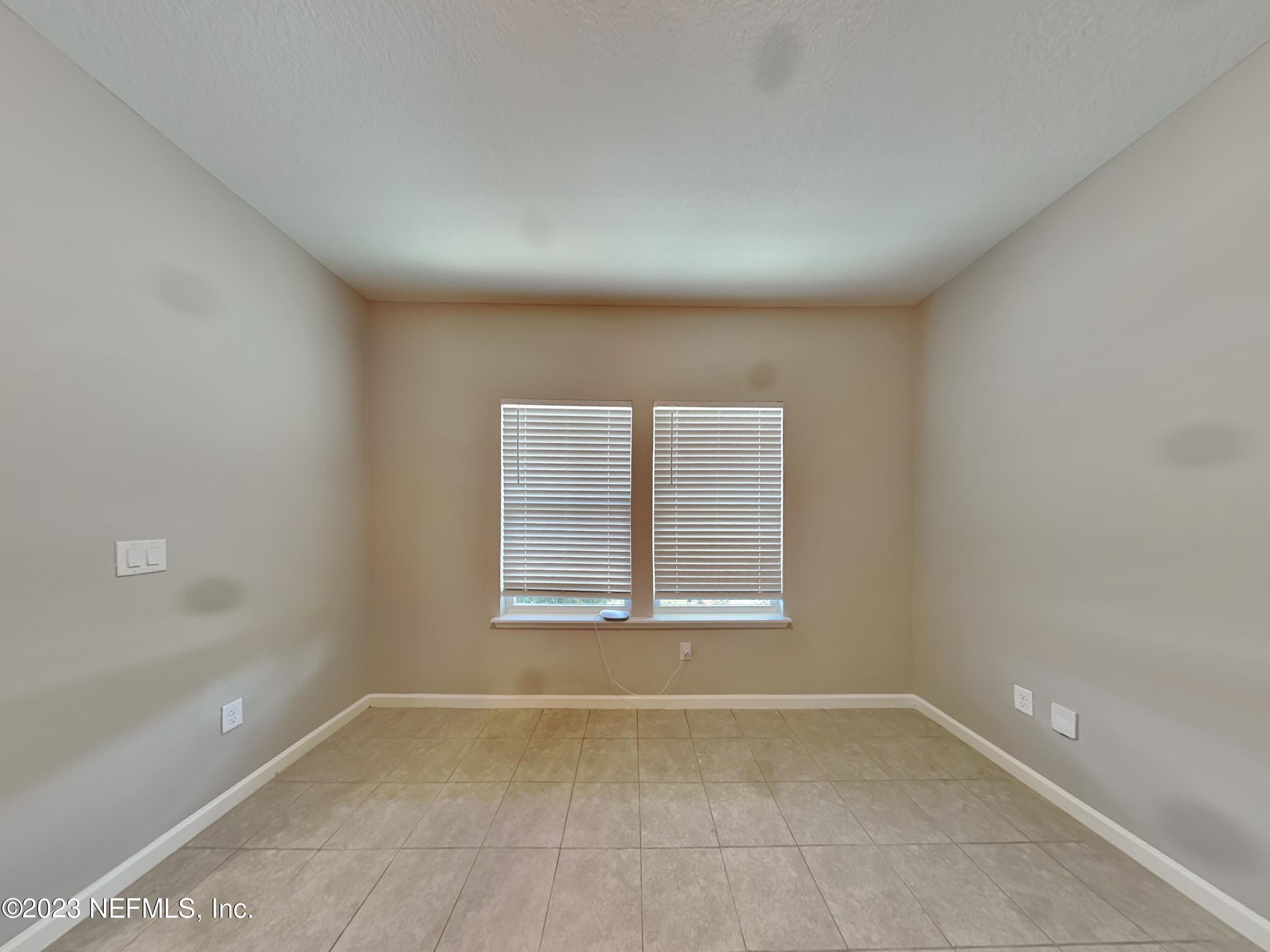 164 Bloomfield Way St. Augustine, FL 32092 - Photo 19 of 21 a view of an empty room with a window