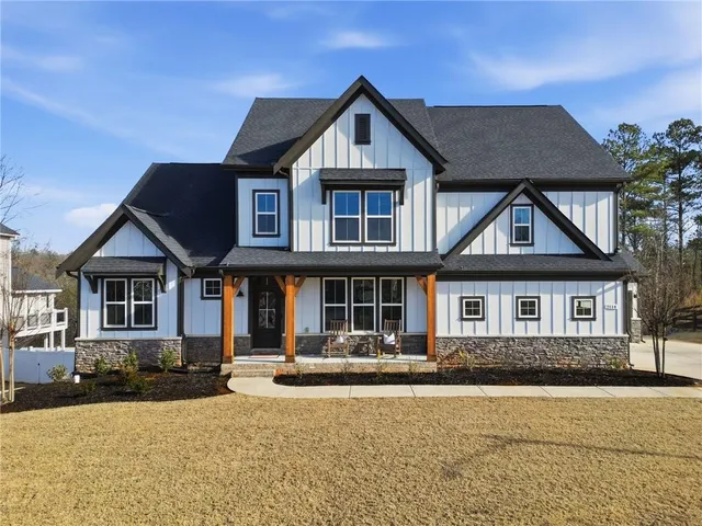 front view of a house with a yard