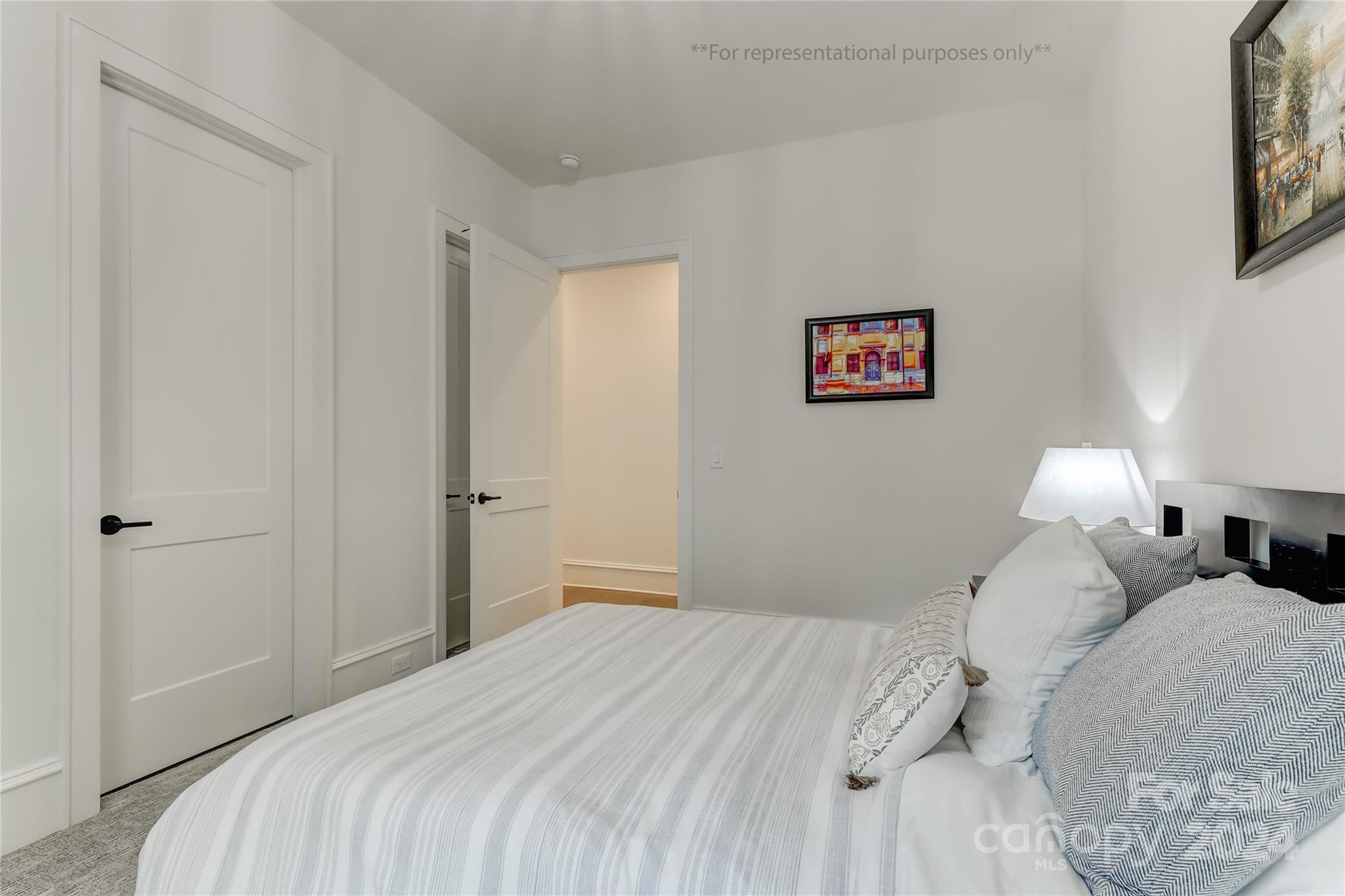 2306 Bridgewater Road, Unit 3 Rock Hill, SC 29730 - Photo 16 of 23 a bedroom with a bed and a painting on the wall