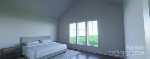 a room with a bed and a window
