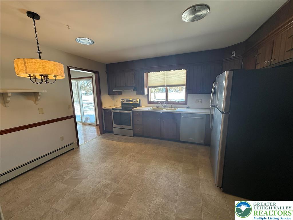 4754 Lowhill Church Road New Tripoli, PA 18066 - Photo 11 of 17 a kitchen with refrigerator and window