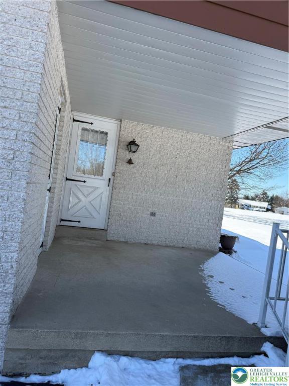 4754 Lowhill Church Road New Tripoli, PA 18066 - Photo 4 of 17 a view of a livingroom with furniture and staircase