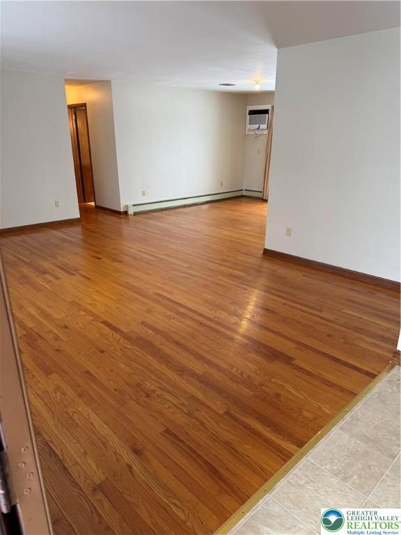 4754 Lowhill Church Road New Tripoli, PA 18066 - Photo 5 of 17 a view of an empty room with wooden floor