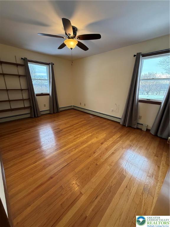 4754 Lowhill Church Road New Tripoli, PA 18066 - Photo 8 of 17 wooden floor in an empty room with a window