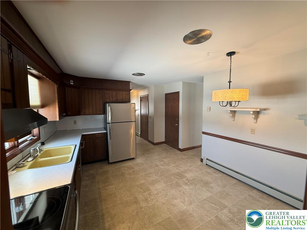 4754 Lowhill Church Road New Tripoli, PA 18066 - Photo 10 of 17 a kitchen with refrigerator and window