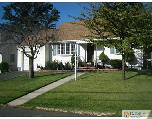 26 Dover Road Colonia, NJ 07067 - Photo 1 of 13 a view of a park with large trees