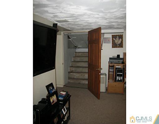 26 Dover Road Colonia, NJ 07067 - Photo 12 of 13 a view of a livingroom with storage and utility