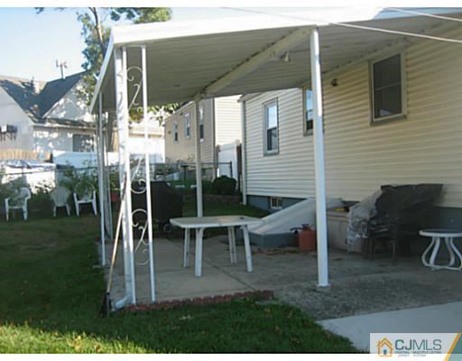 26 Dover Road Colonia, NJ 07067 - Photo 3 of 13 a view of outdoor space yard and patio
