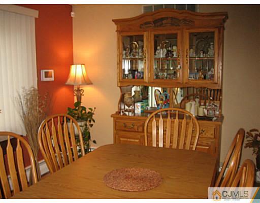 26 Dover Road Colonia, NJ 07067 - Photo 6 of 13 a view of entryway livingroom and hall with wooden floor
