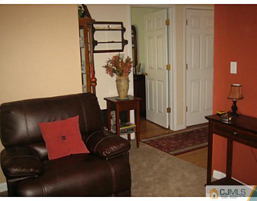 26 Dover Road Colonia, NJ 07067 - Photo 9 of 13 a living room with furniture