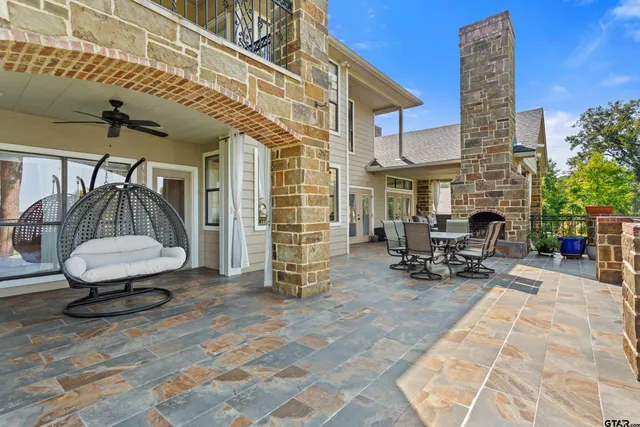 a view of a chairs and tables in the patio