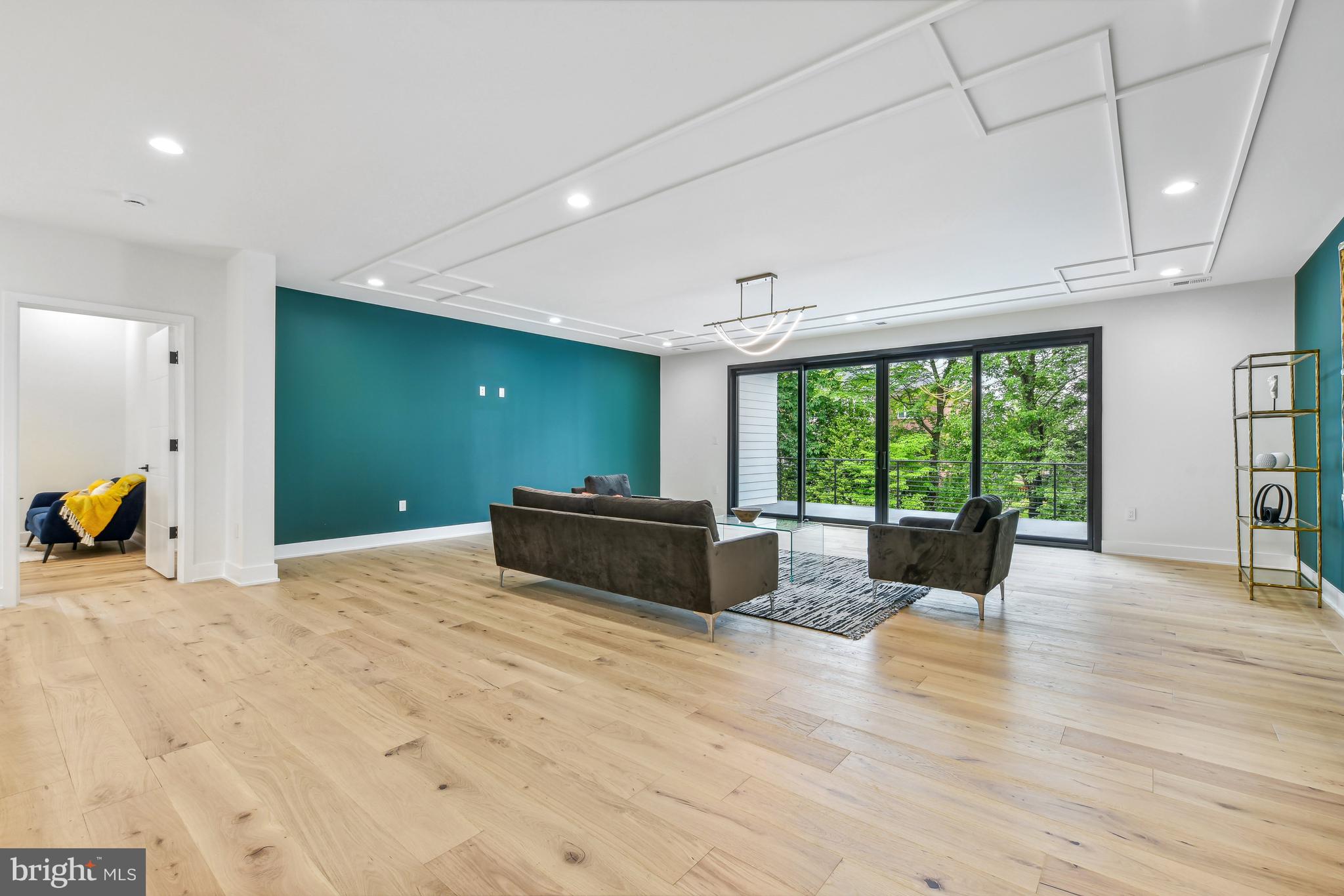 7102 Capitol View Drive McLean, VA 22101 - Photo 22 of 40 a living room with furniture and large windows