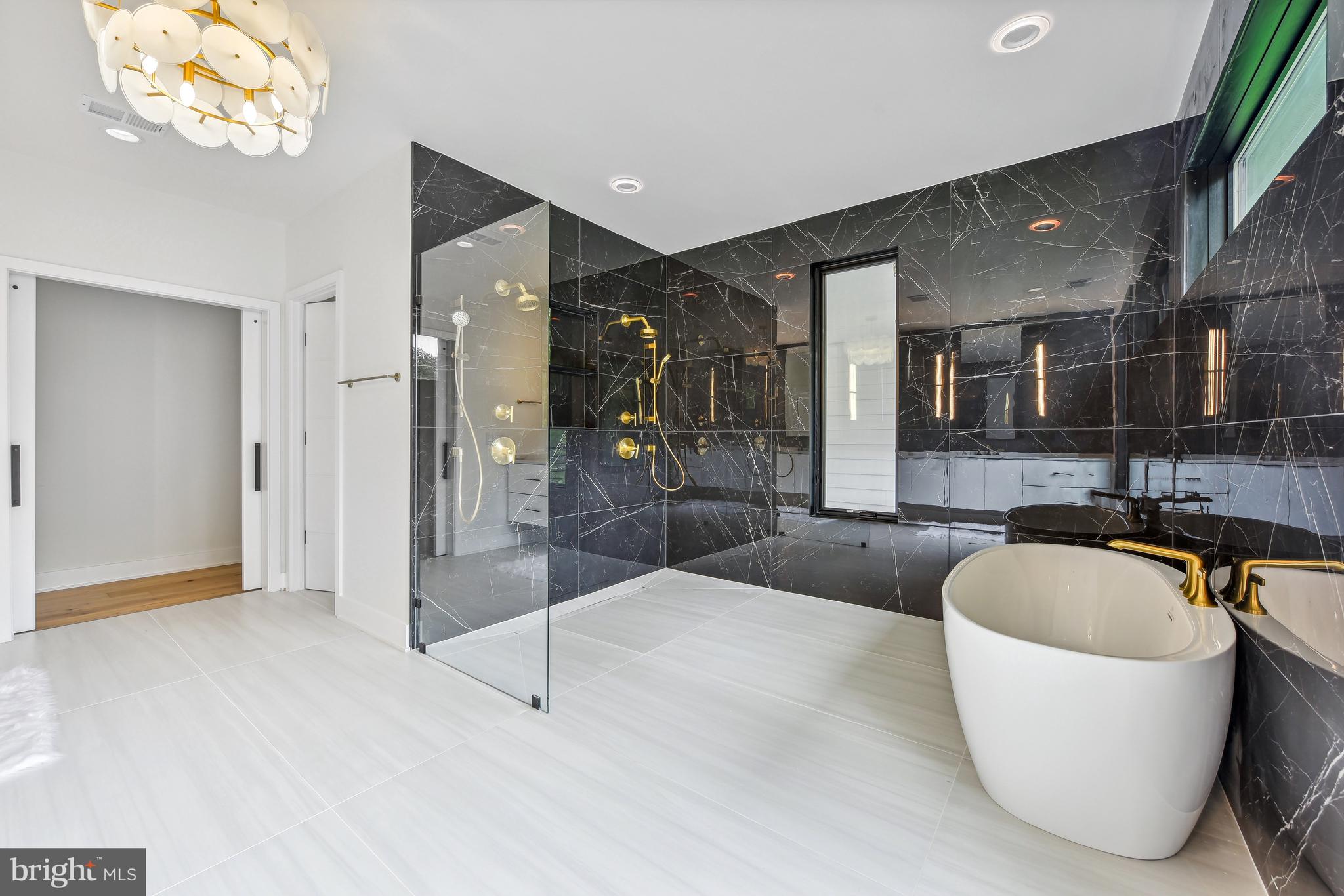 7102 Capitol View Drive McLean, VA 22101 - Photo 25 of 40 a spacious bathroom with a tub and shower