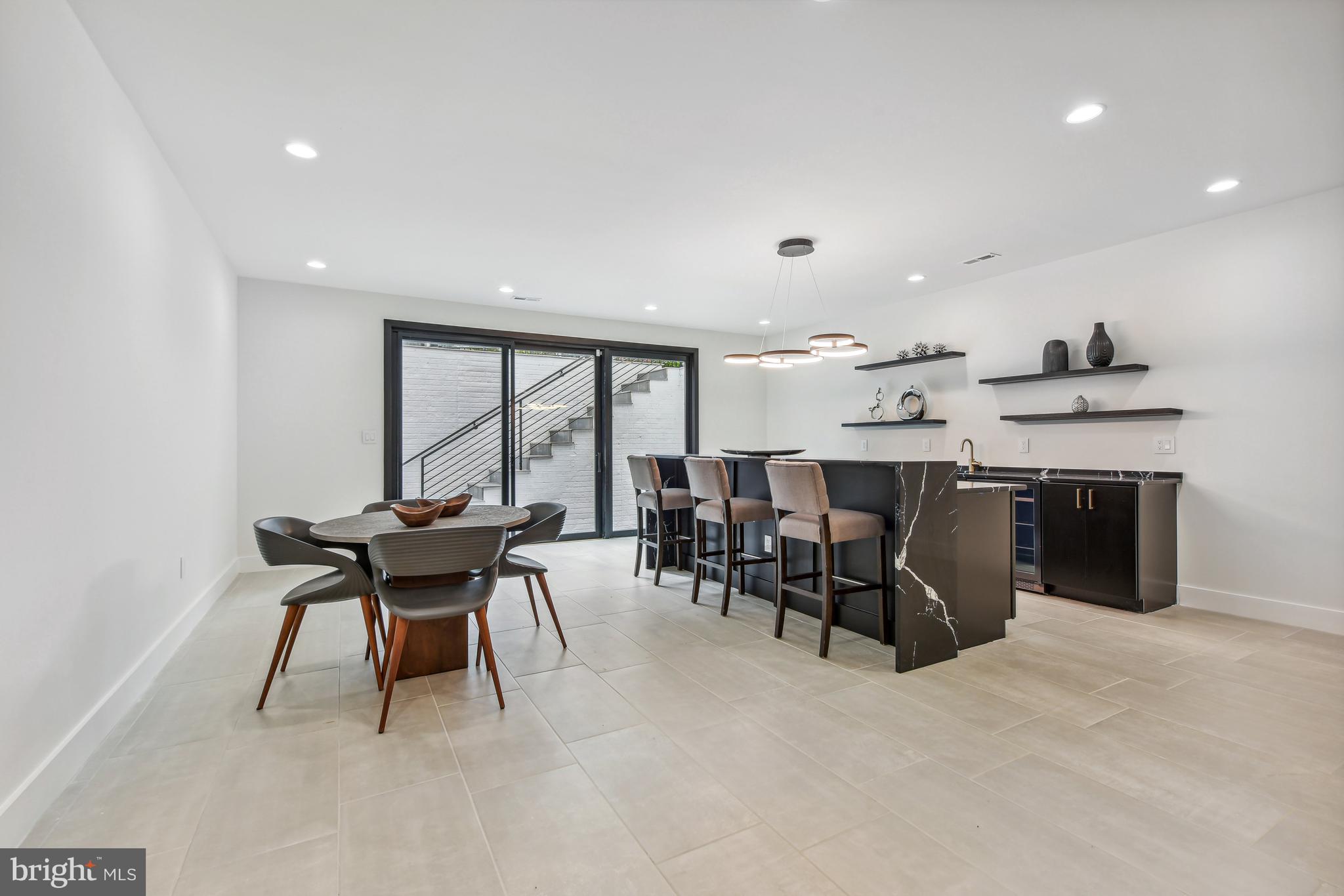 7102 Capitol View Drive McLean, VA 22101 - Photo 31 of 40 a view of a dining room with furniture window and outside view