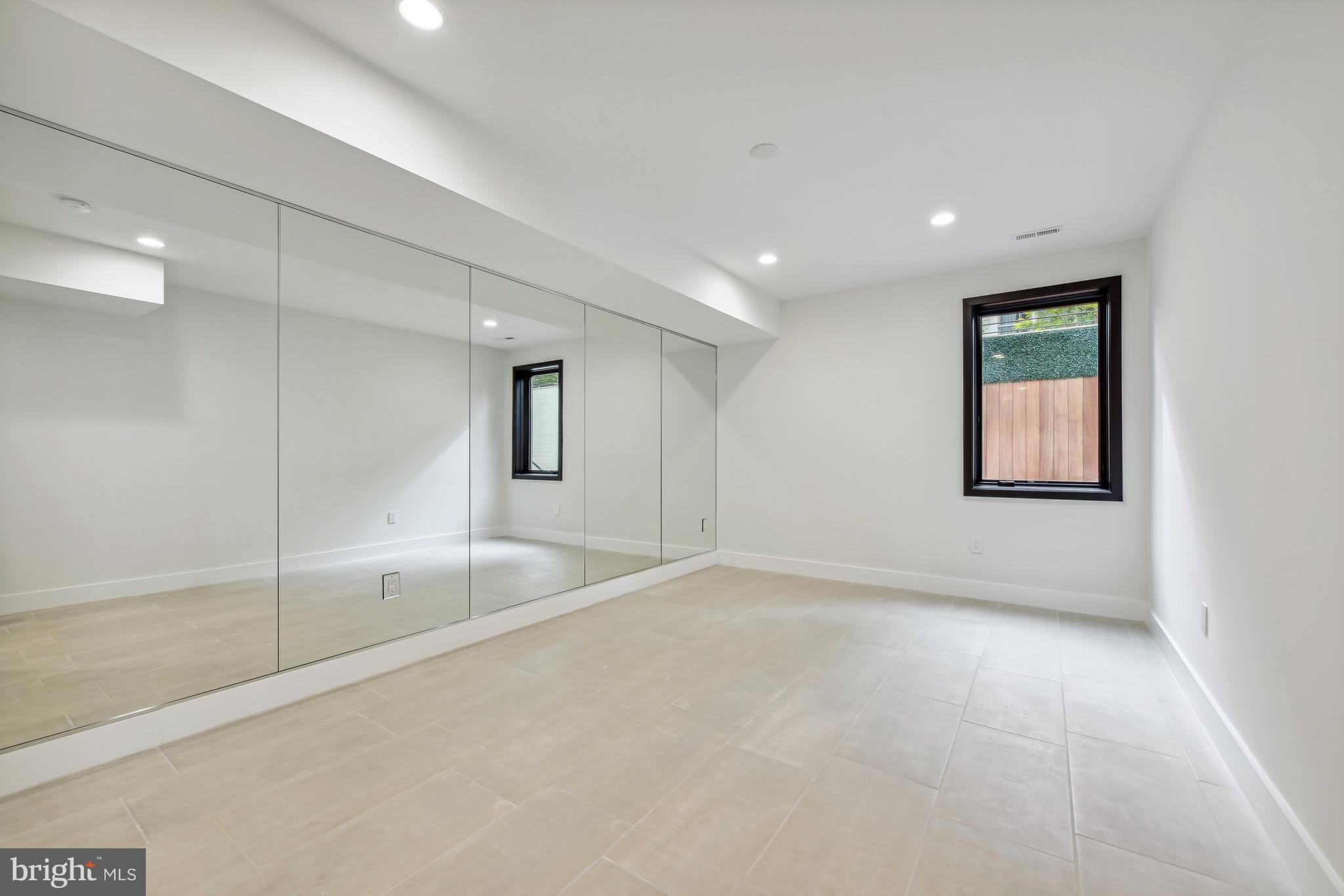 7102 Capitol View Drive McLean, VA 22101 - Photo 32 of 40 a view of an empty room with a window