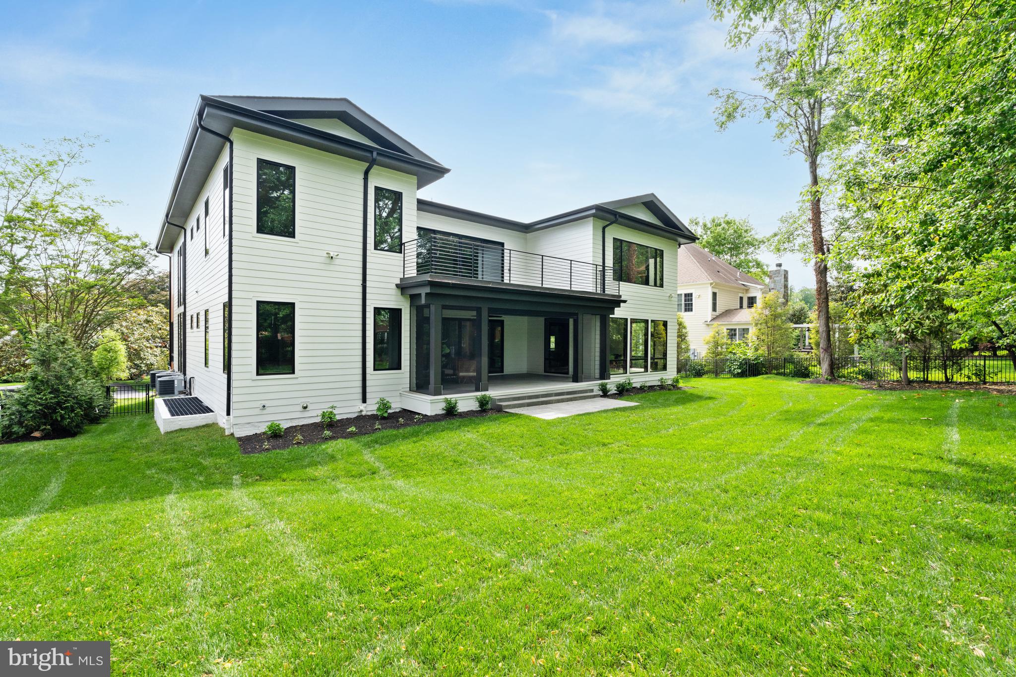7102 Capitol View Drive McLean, VA 22101 - Photo 37 of 40 a front view of a house with a garden