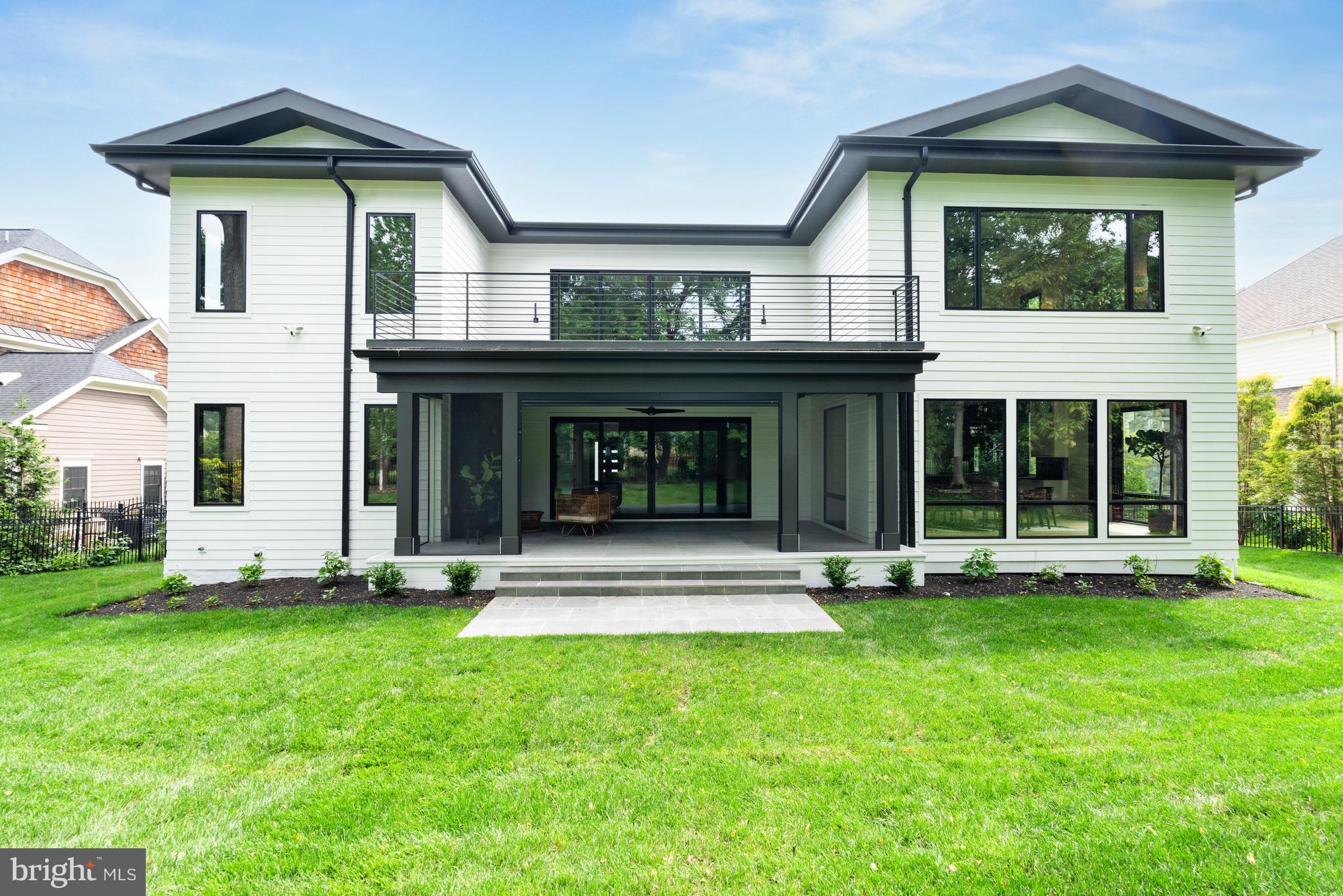 7102 Capitol View Drive McLean, VA 22101 - Photo 38 of 40 a front view of a house with a yard