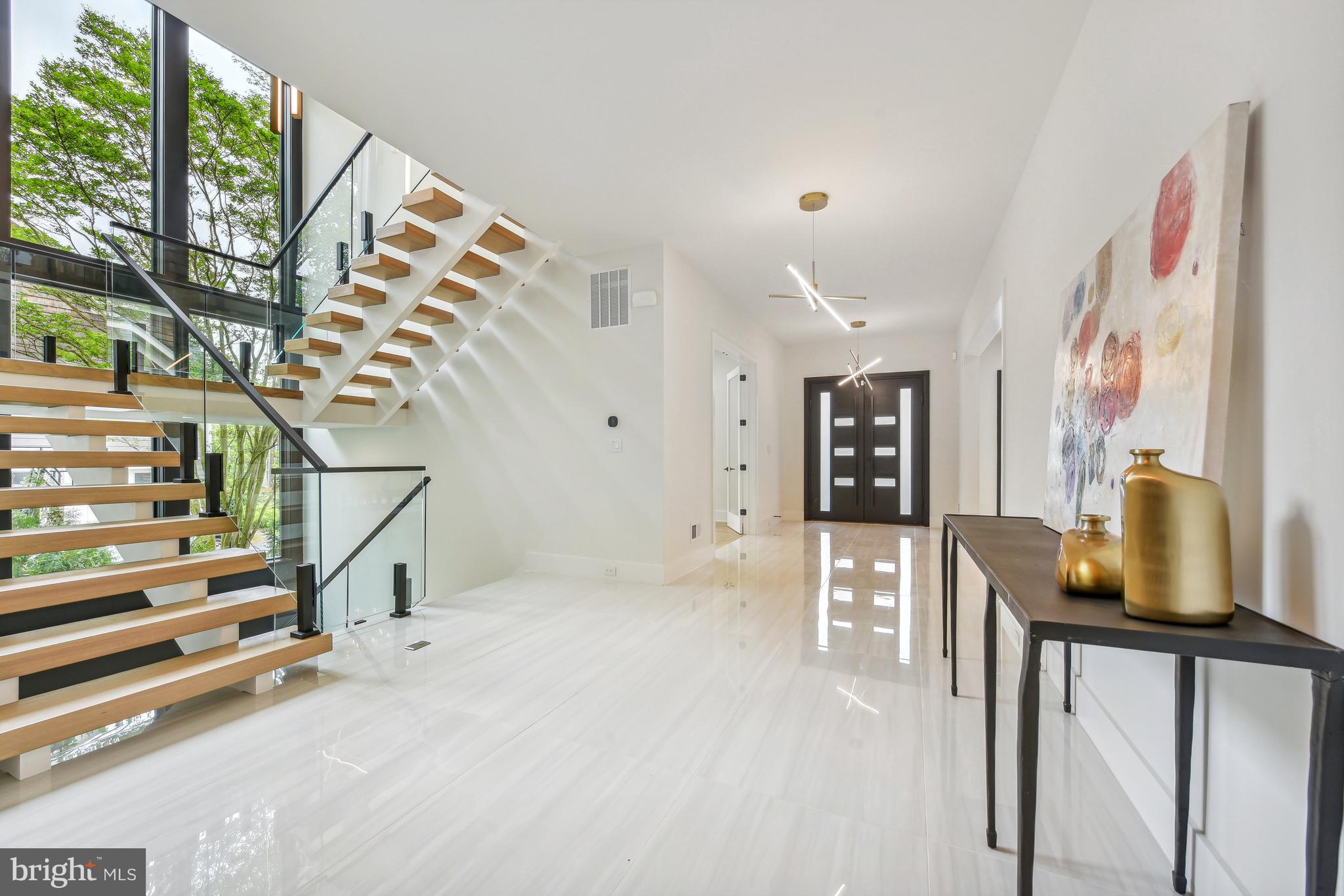 7102 Capitol View Drive McLean, VA 22101 - Photo 5 of 40 a view of an entryway with wooden floor