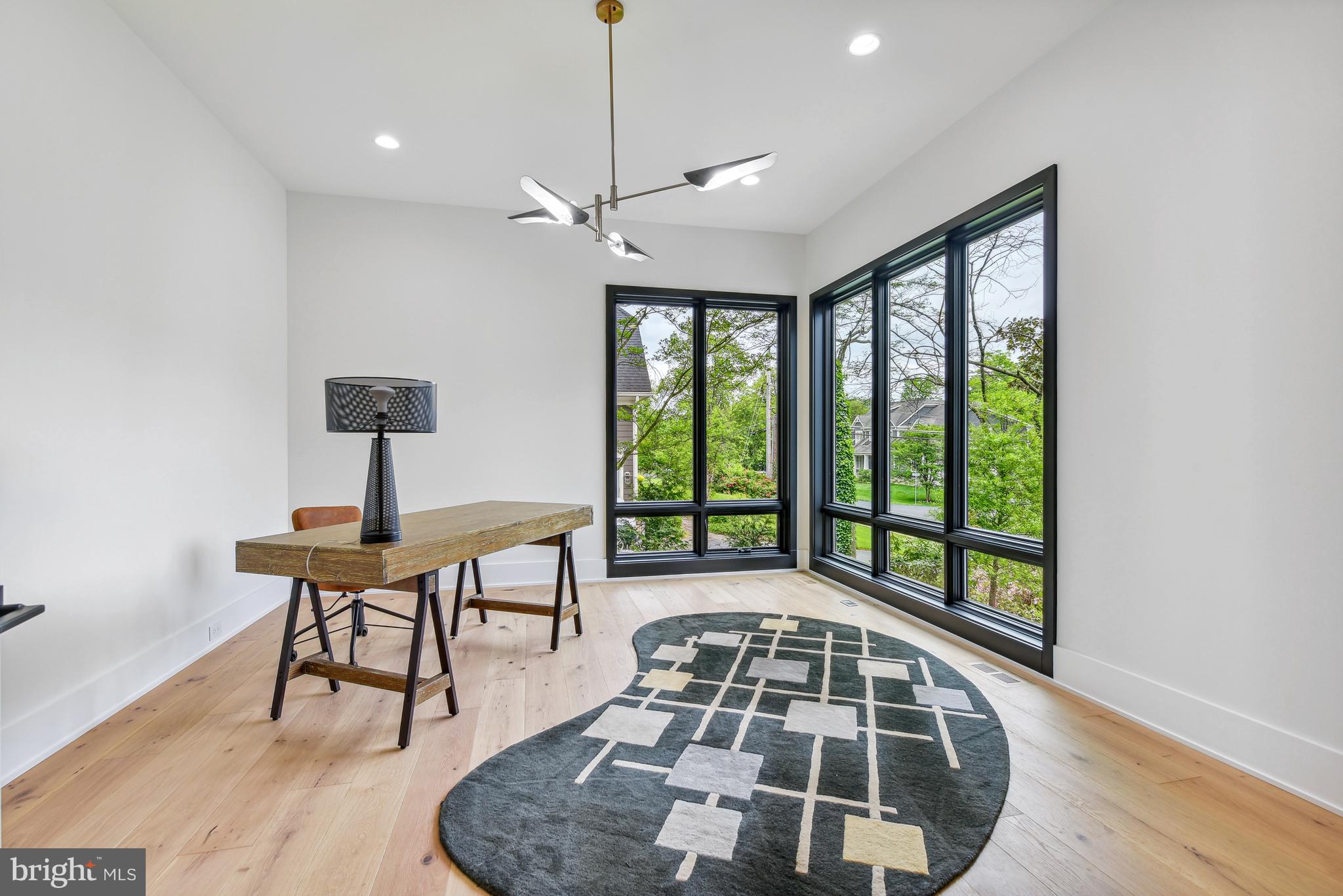 7102 Capitol View Drive McLean, VA 22101 - Photo 8 of 40 a very nice looking room with many windows