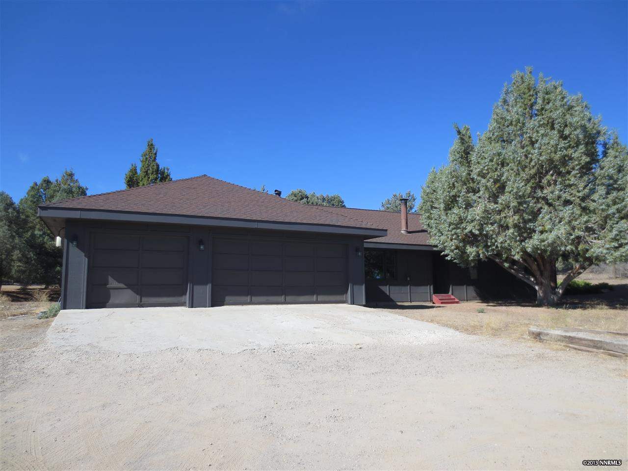 1580 Prospect Road Reno, NV 89521 - Photo 1 of 1 a view of a house with a snow in the yard