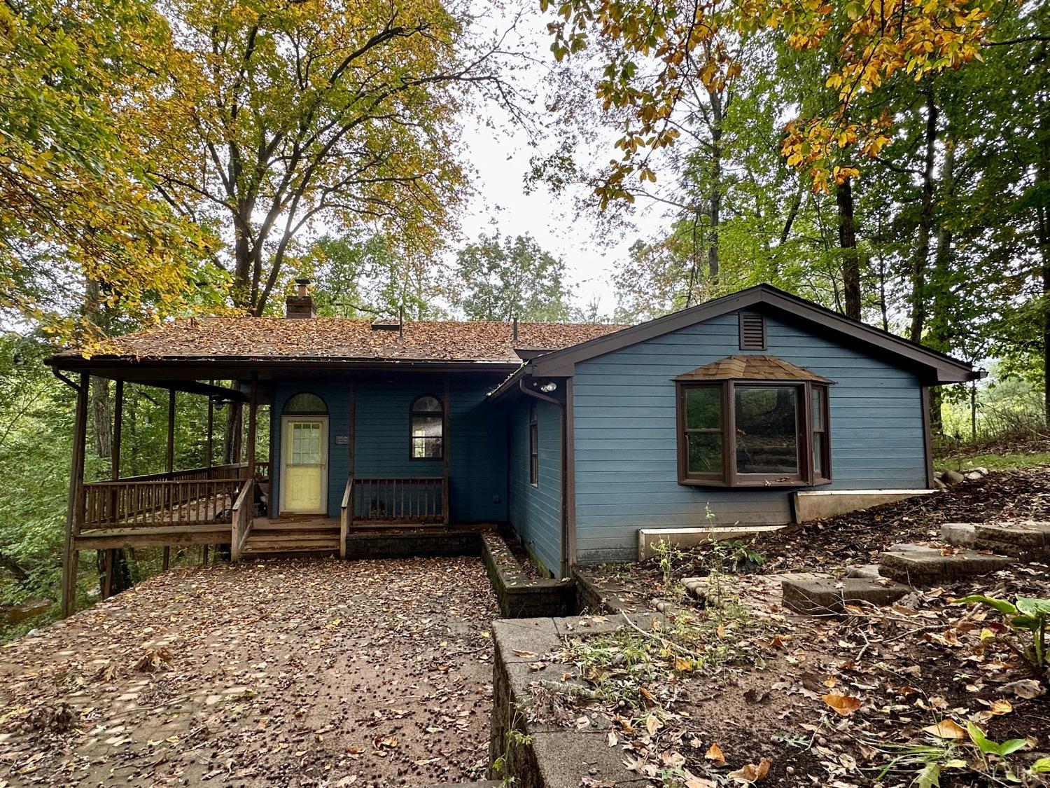 3454 County Line Road Appomattox, VA 24522 - Photo 1 of 1 a front view of a house with garden