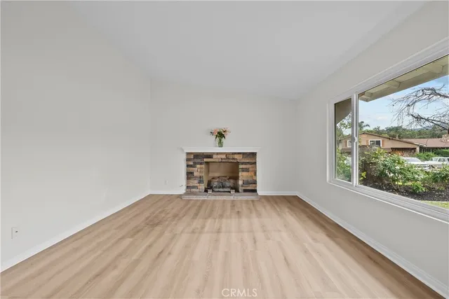 a view of an empty room and window