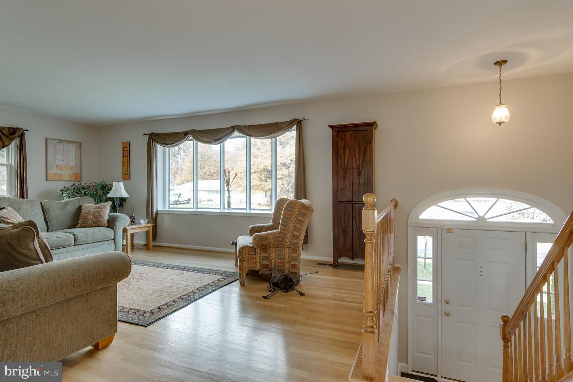 19305 Olney Mill Road Olney, MD 20832 - Photo 3 of 27 a living room with furniture and a large window